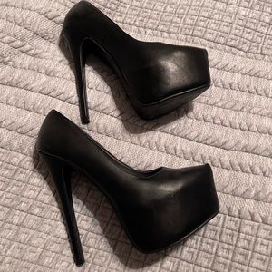 Skyscraper 7” high heels. Black size 7.